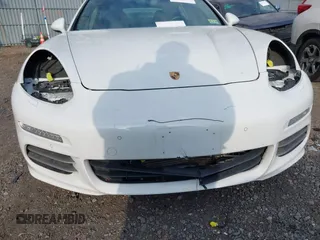 2016 Porsche Panamera 4 z VIN WP0AA2A78GL002029, wystawiony jako IAAI lot #41644555 z przebiegiem 54 915 mil mil oraz . Historia ofert i sprzedaży dostępna na DreamBid. Obrazek 6.