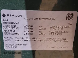 2023 Rivian R1T Adventure z VIN 7FCTGAAAXPN019894, wystawiony jako IAAI lot #42168226 z przebiegiem 23 380 mil mil oraz . Historia ofert i sprzedaży dostępna na DreamBid. Obrazek 9.