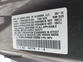 2016 Honda Odyssey Touring Elite with VIN 5FNRL5H90GB128006, listed as a IAAI auction lot 41695438 with 133,337 mi miles. Bid and sale history available at carsss.com. Image 9.