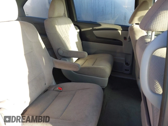 2015 Honda Odyssey LX с VIN 5FNRL5H27FB068761, выставлен на аукционе IAAI как лот 41479420 с пробегом 84 532 миль миль и . История ставок и продаж доступна на DreamBid. Изображение 8.