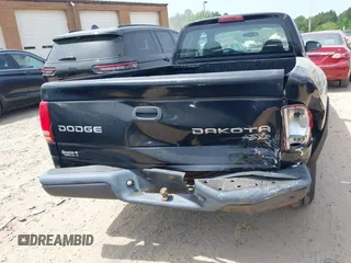 2003 Dodge Dakota z VIN 1D7HL12X73S381323, wystawiony jako IAAI lot #42161329 z przebiegiem 219 083 mil mil oraz . Historia ofert i sprzedaży dostępna na DreamBid. Obrazek 15.