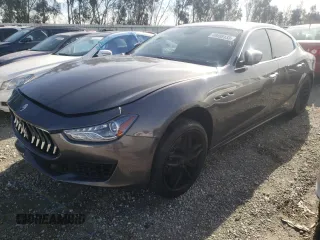 2018 Maserati Ghibli S with VIN ZAM57YSA2J1271008, listed as a Copart auction lot 80499133 with 63,034 mi miles. Bid and sale history available at carsss.com. Image 1.