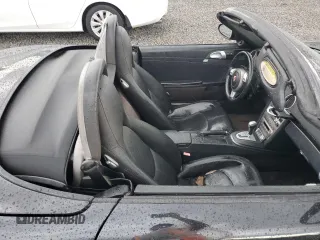 2005 Porsche Boxster z VIN WP0CA298X5U712515, wystawiony jako Copart lot #74030354 z przebiegiem Nie podano mil oraz Szkoda całkowita • Salvage title. Historia ofert i sprzedaży dostępna na DreamBid. Obrazek 10.