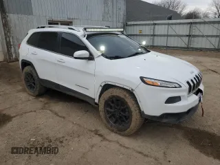 2018 Jeep Cherokee Latitude Tech Connect with VIN 1C4PJMCB5JD529390, listed as a Copart auction lot 50791305 with 140,585 mi miles and Salvage title. Bid and sale history available at DreamBid. Image 4.