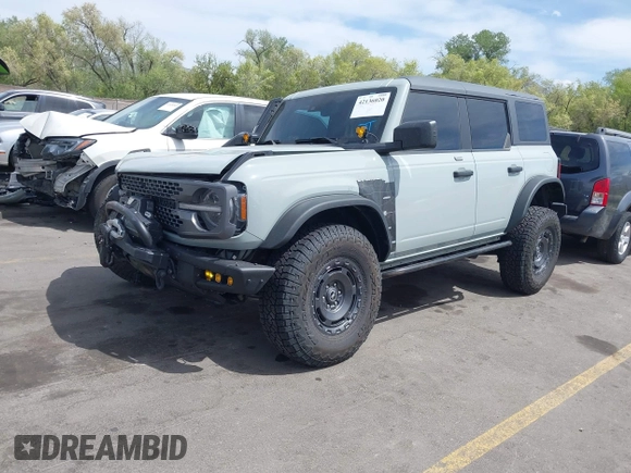 2023 Ford Bronco with VIN 1FMEE5DHXPLB22549, listed as a IAAI auction lot 42136020 with 54,383 mi miles and . Bid and sale history available at DreamBid. Image 2.
