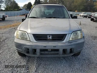 2001 Honda CR-V LX with VIN JHLRD28411S019499, listed as a Copart auction lot 76683944 with 257,124 mi miles and Salvage Title. Bid and sale history available at carsss.com. Image 5.