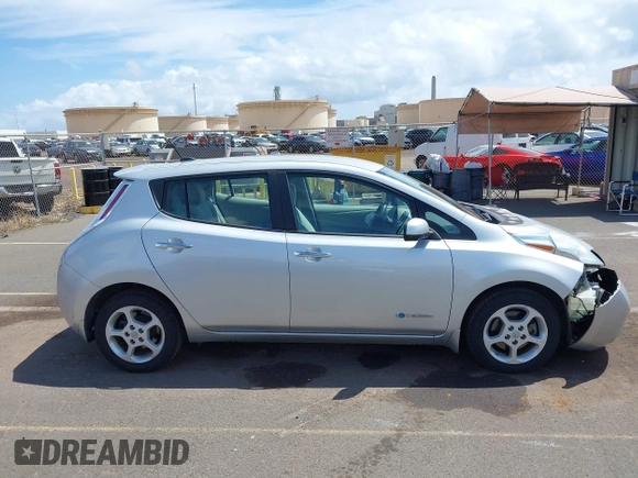 2015 Nissan LEAF S z VIN 1N4AZ0CP5FC307440, wystawiony jako IAAI lot #41940583 z przebiegiem 60 727 mil mil oraz . Historia ofert i sprzedaży dostępna na DreamBid. Obrazek 13.