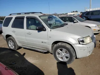 2007 Mercury Mariner with VIN 4M2CU39H87KJ11108, listed as a Copart auction lot 74314124 with 225,901 mi miles and Salvage title. Bid and sale history available at DreamBid. Image 4.