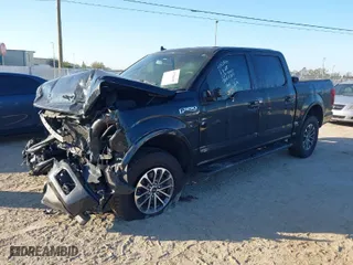 2018 Ford F-150 XL with VIN 1FTEW1E55JFB36007, listed as a IAAI auction lot 41788565 with 999,999 mi miles. Bid and sale history available at carsss.com. Image 2.