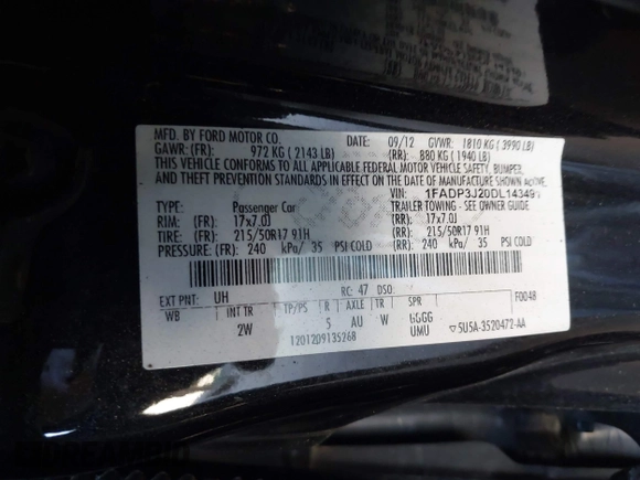 2013 Ford Focus Titanium with VIN 1FADP3J20DL143491, listed as a IAAI auction lot 42034388 with 194,388 mi miles and . Bid and sale history available at carsss.com. Image 9.