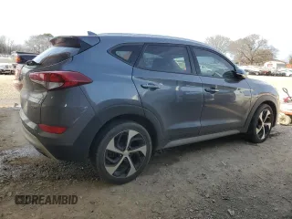 2018 Hyundai Tucson Sport with VIN KM8J33AL0JU802026, listed as a Copart auction lot 45869445 with 124,669 mi miles and Salvage Title. Bid and sale history available at carsss.com. Image 3.
