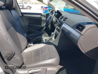 2012 Volkswagen Passat SE z VIN 1VWBP7A36CC068499, wystawiony jako IAAI lot #41932731 z przebiegiem 208 896 mil mil oraz . Historia ofert i sprzedaży dostępna na DreamBid. Obrazek 5.