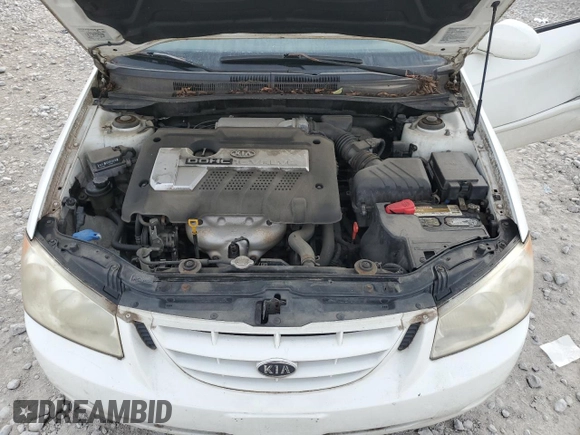 2006 Kia Spectra EX with VIN KNAFE121265208526, listed as a Copart auction lot 80300604 with 101,780 mi miles and Salvage Title. Bid and sale history available at carsss.com. Image 11.