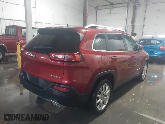 2015 Jeep Cherokee Limited with VIN 1C4PJLDS0FW585595, listed as a IAAI auction lot 41371621 with 102,108 mi miles and . Bid and sale history available at DreamBid. Image 4.