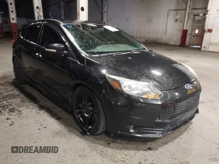 2014 Ford Focus ST with VIN 1FADP3L96EL355713, listed as a IAAI auction lot 41572939 with 102,838 mi miles and . Bid and sale history available at carsss.com. Image 1.