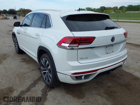 2023 Volkswagen Atlas SEL Premium R-Line z VIN 1V2FE2CA8PC221736, wystawiony jako IAAI lot #42155629 z przebiegiem 54 394 mil mil oraz . Historia ofert i sprzedaży dostępna na DreamBid. Obrazek 3.