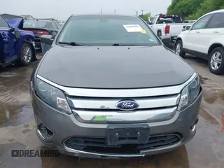 2012 Ford Fusion Hybrid z VIN 3FADP0L33CR289548, wystawiony jako IAAI lot #41905806 z przebiegiem 121 233 mil mil oraz . Historia ofert i sprzedaży dostępna na DreamBid. Obrazek 6.
