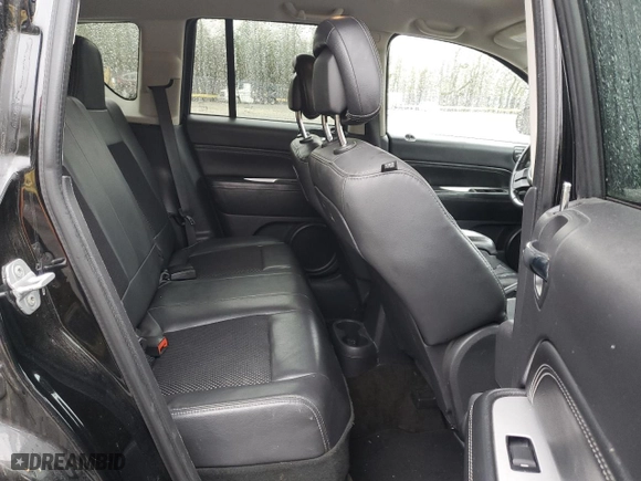 2014 Jeep Compass Latitude with VIN 1C4NJCEB8ED628192, listed as a Copart auction lot 51836275 with 217,987 mi miles and Clean Title. Bid and sale history available at carsss.com. Image 11.