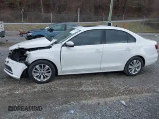 2016 Volkswagen Jetta Sedan 1.4T SE with VIN 3VWD67AJ3GM392427, listed as a IAAI auction lot 41704763 with 84,152 mi miles. Bid and sale history available at carsss.com. Image 14.