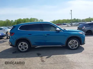 2023 BMW X1 xDrive28i with VIN WBX73EF00P5W52935, listed as a IAAI auction lot 42221084 with 16,394 mi miles and . Bid and sale history available at DreamBid. Image 13.