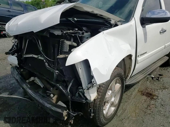 2007 Chevrolet Tahoe LTZ z VIN 1GNFC13J07R177477, wystawiony jako Copart lot #56707715 z przebiegiem 222 879 mil mil oraz Szkoda całkowita • Salvage title. Historia ofert i sprzedaży dostępna na DreamBid. Obrazek 15.