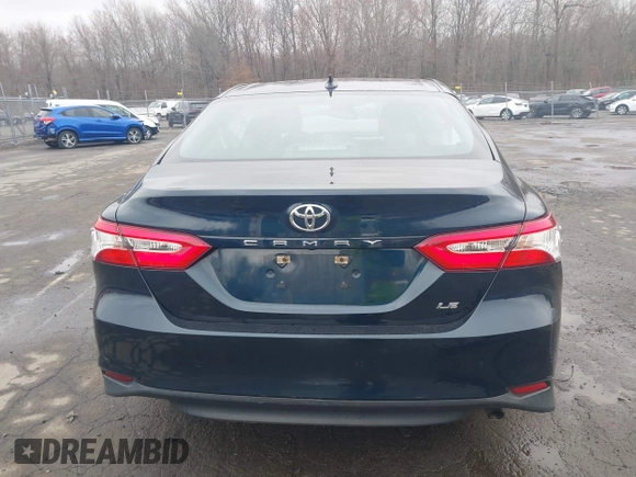 2020 Toyota Camry LE with VIN 4T1L11AK3LU977805, listed as a IAAI auction lot 41907558 with 82,237 mi miles and . Bid and sale history available at DreamBid. Image 17.