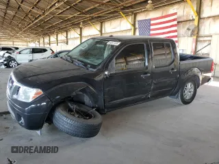 2018 Nissan Frontier SV with VIN 1N6DD0ER5JN705942, listed as a Copart auction lot 64057355 with 106,617 mi miles and Salvage title. Bid and sale history available at DreamBid. Image 1.