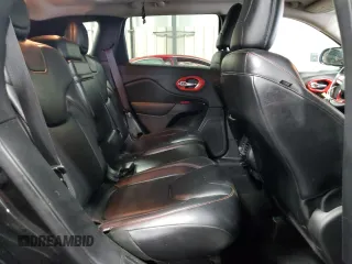 2014 Jeep Cherokee Trailhawk with VIN 1C4PJMBSXEW187981, listed as a Copart auction lot 56711885 with 157,317 mi miles and Salvage title. Bid and sale history available at DreamBid. Image 11.