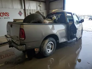 2002 Ford F-150 XL with VIN 1FTRF17252NB01401, listed as a Copart auction lot 88121125 with 0 mi miles and Salvage Title. Bid and sale history available at carsss.com. Image 3.