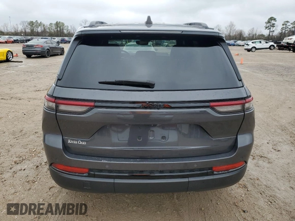2023 Jeep Grand Cherokee Altitude with VIN 1C4RJGAG7PC573429, listed as a Copart auction lot 42961295 with 9,704 mi miles and Salvage title. Bid and sale history available at DreamBid. Image 6.
