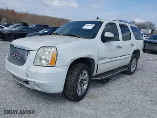 2007 GMC Yukon Denali with VIN 1GKFK638X7J136699, listed as a IAAI auction lot 41803850 with 192,541 mi miles. Bid and sale history available at carsss.com. Image 2.