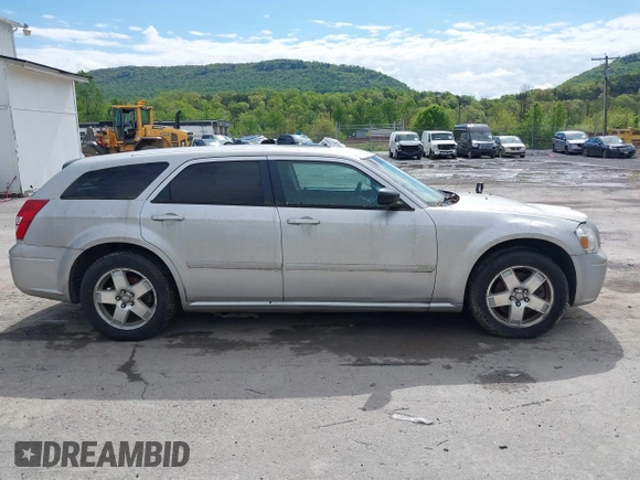 2005 Dodge Magnum SXT z VIN 2D4GZ48V358579406, wystawiony jako IAAI lot #42198627 z przebiegiem 264 473 mil mil oraz . Historia ofert i sprzedaży dostępna na DreamBid. Obrazek 13.