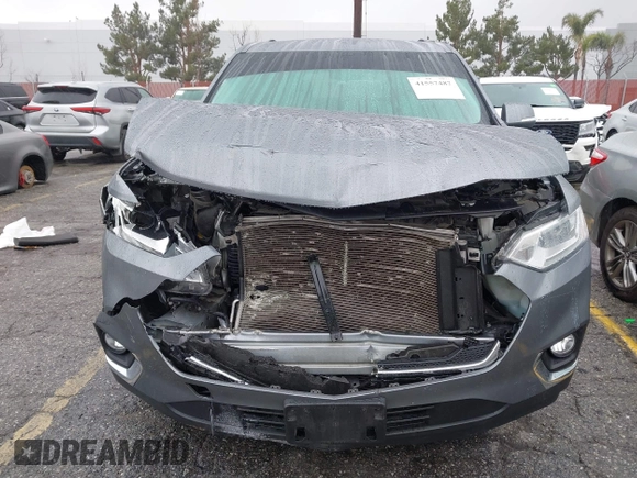 2021 Chevrolet Traverse LT z VIN 1GNERHKWXMJ249859, wystawiony jako IAAI lot #41557487 z przebiegiem 49 849 mil mil oraz . Historia ofert i sprzedaży dostępna na DreamBid. Obrazek 13.