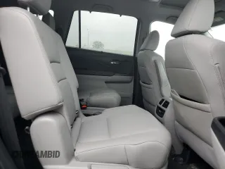 2022 Honda Pilot Touring 7-Passenger z VIN 5FNYF5H63NB015091, wystawiony jako Copart lot #56323725 z przebiegiem 28 614 mil mil oraz Szkoda całkowita • Salvage title. Historia ofert i sprzedaży dostępna na DreamBid. Obrazek 11.