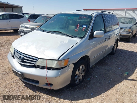 2004 Honda Odyssey EX-L with VIN 5FNRL18904B080009, listed as a IAAI auction lot 41736651 with 461,326 mi miles and . Bid and sale history available at DreamBid. Image 2.