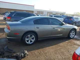 2012 Dodge Charger SE with VIN 2C3CDXBG2CH297166, listed as a IAAI auction lot 41992613 with 136,755 mi miles. Bid and sale history available at carsss.com. Image 14.
