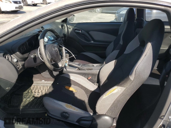 2003 Toyota Celica GT with VIN JTDDR32T130164099, listed as a Copart auction lot 77907374 with 73,950 mi miles and Salvage Title. Bid and sale history available at carsss.com. Image 7.