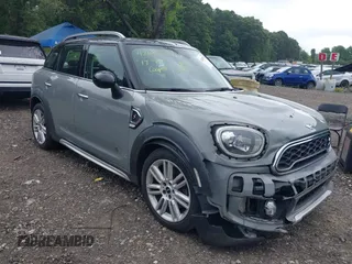 2017 MINI Countryman Cooper S z VIN WMZYT5C38H3D81171, wystawiony jako IAAI lot #42685842 z przebiegiem 78 495 mil mil oraz . Historia ofert i sprzedaży dostępna na DreamBid. Obrazek 1.