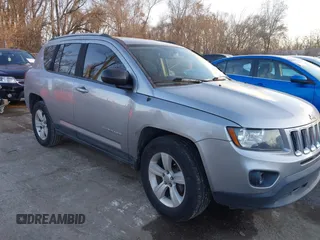 2016 Jeep Compass Sport with VIN 1C4NJCBA1GD743294, listed as a IAAI auction lot 41035177 with 124,379 mi miles. Bid and sale history available at carsss.com. Image 1.