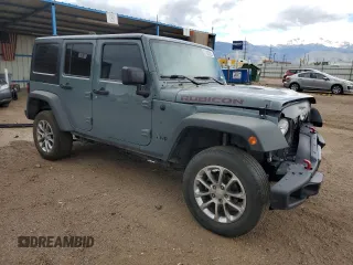 2014 Jeep Wrangler Unlimited Rubicon z VIN 1C4HJWFG0EL316513, wystawiony jako Copart lot #57182325 z przebiegiem 150 012 mil mil oraz Szkoda całkowita • Salvage title. Historia ofert i sprzedaży dostępna na DreamBid. Obrazek 4.