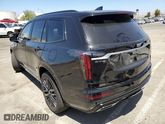 2023 Cadillac XT6 AWD Sport z VIN 1GYKPGRS2PZ130847, wystawiony jako Copart lot #58174474 z przebiegiem 11 958 mil mil oraz Tytuł czysty. Historia ofert i sprzedaży dostępna na DreamBid. Obrazek 2.
