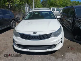 2017 Kia Optima LX with VIN 5XXGT4L32HG156781, listed as a IAAI auction lot 42044826 with 295,162 mi miles and . Bid and sale history available at carsss.com. Image 12.