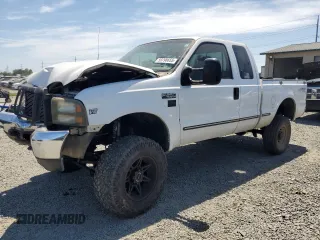 1999 Ford F-250 XL with VIN 1FTNX21F4XEA88550, listed as a Copart auction lot 59798655 with 310,287 mi miles and Salvage title. Bid and sale history available at DreamBid. Image 1.