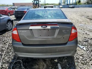 2012 Ford Fusion SEL z VIN 3FAHP0JA2CR293240, wystawiony jako Copart lot #54842035 z przebiegiem 236 208 mil mil oraz Szkoda całkowita • Salvage title. Historia ofert i sprzedaży dostępna na DreamBid. Obrazek 6.