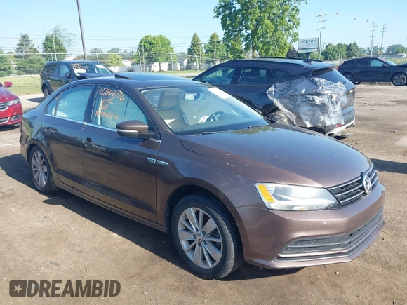 2015 Volkswagen Jetta Sport z VIN 3VWD17AJ5FM411217, wystawiony jako IAAI lot #42563776 z przebiegiem 84 520 mil mil oraz . Historia ofert i sprzedaży dostępna na DreamBid. Obrazek 1.