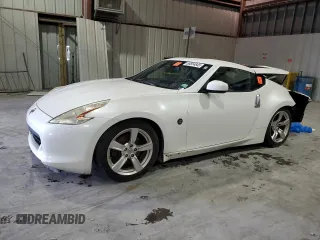2012 Nissan 370Z z VIN JN1AZ4EH3CM565276, wystawiony jako Copart lot #56654845 z przebiegiem 77 788 mil mil oraz Nie do naprawy. Historia ofert i sprzedaży dostępna na DreamBid. Obrazek 1.