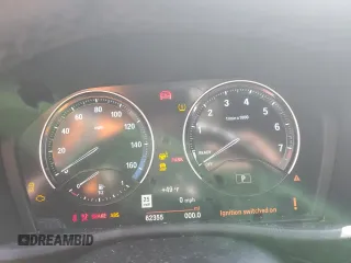 2021 BMW X1 xDrive28i z VIN WBXJG9C02M5S18999, wystawiony jako Copart lot #50194425 z przebiegiem 62 355 mil mil oraz Szkoda całkowita • Salvage title. Historia ofert i sprzedaży dostępna na DreamBid. Obrazek 9.