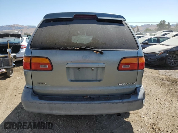 2000 Toyota Sienna LE with VIN 4T3ZF13C6YU296375, listed as a Copart auction lot 63846875 with 279,915 mi miles and Salvage title. Bid and sale history available at DreamBid. Image 6.
