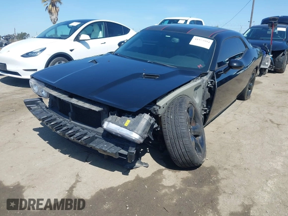 2014 Dodge Challenger R/T with VIN 2C3CDYBT8EH280622, listed as a IAAI auction lot 41973994 with 86,983 mi miles and . Bid and sale history available at DreamBid. Image 2.