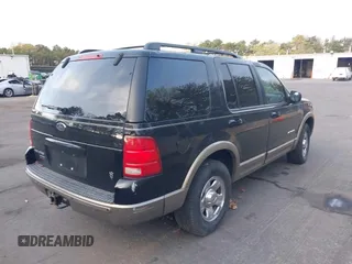 2002 Ford Explorer Eddie Bauer with VIN 1FMZU74W92ZB32879, listed as a IAAI auction lot 39327971 with 128,592 mi miles and . Bid and sale history available at DreamBid. Image 4.